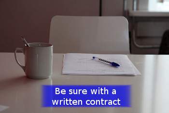image of a contract with a pen on a table.