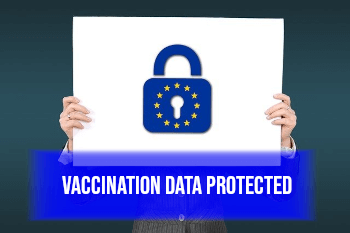 Person holding sign with blue padlock covered in GDPR logo and text stating vaccination data protected